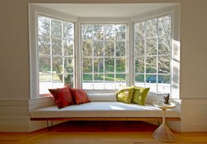 mid century wood chair bay window decorating ideas living room midcentury with bay window narrow plank wood floor